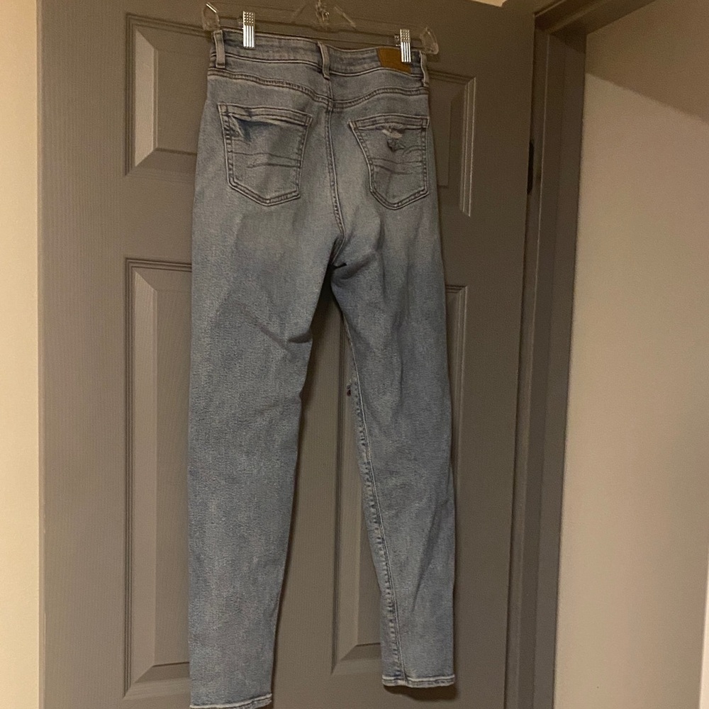 Distressed Light Blue American Eagle Stretch Jeans Size 0 - Picture 3 of 3